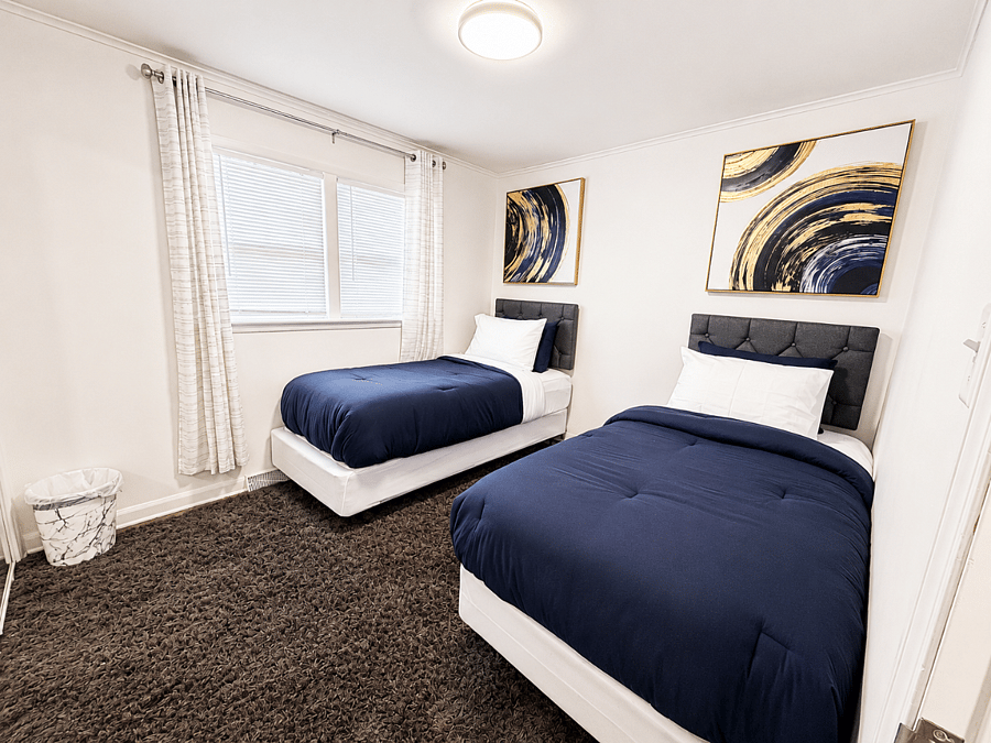 Twin bedroom ideal for teammates or children.