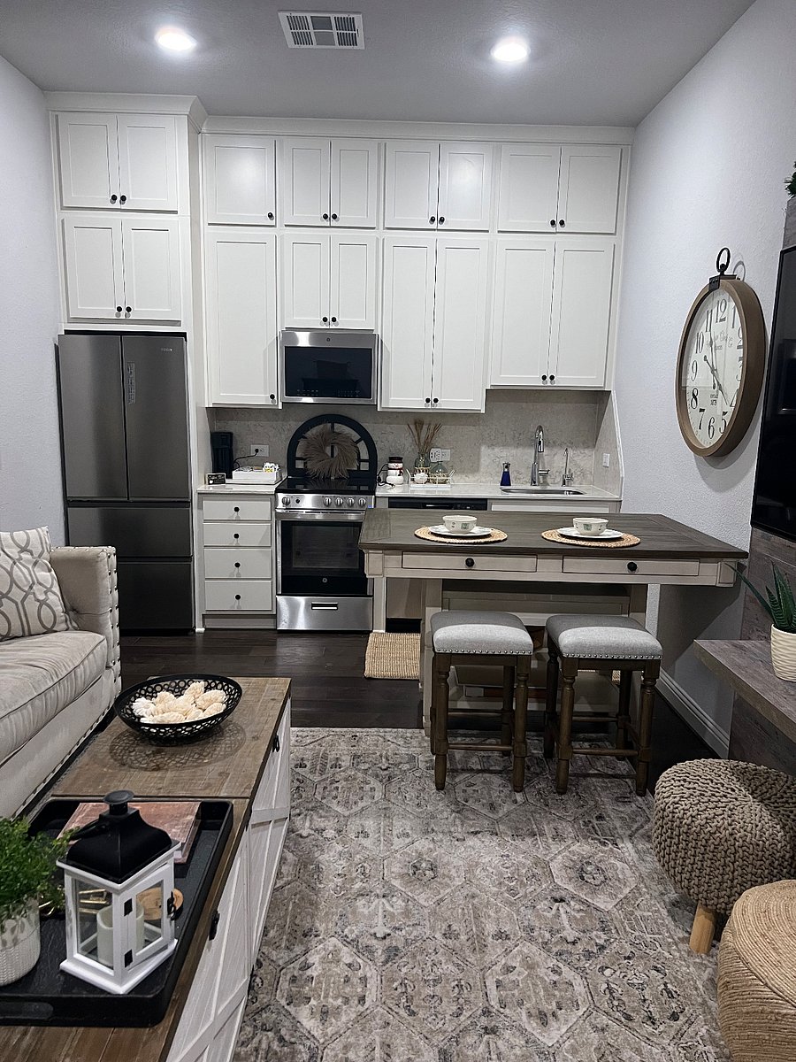 Brand new GE Stainless Steel Appliances with custom marble counter top. Extra cabinets for storage.