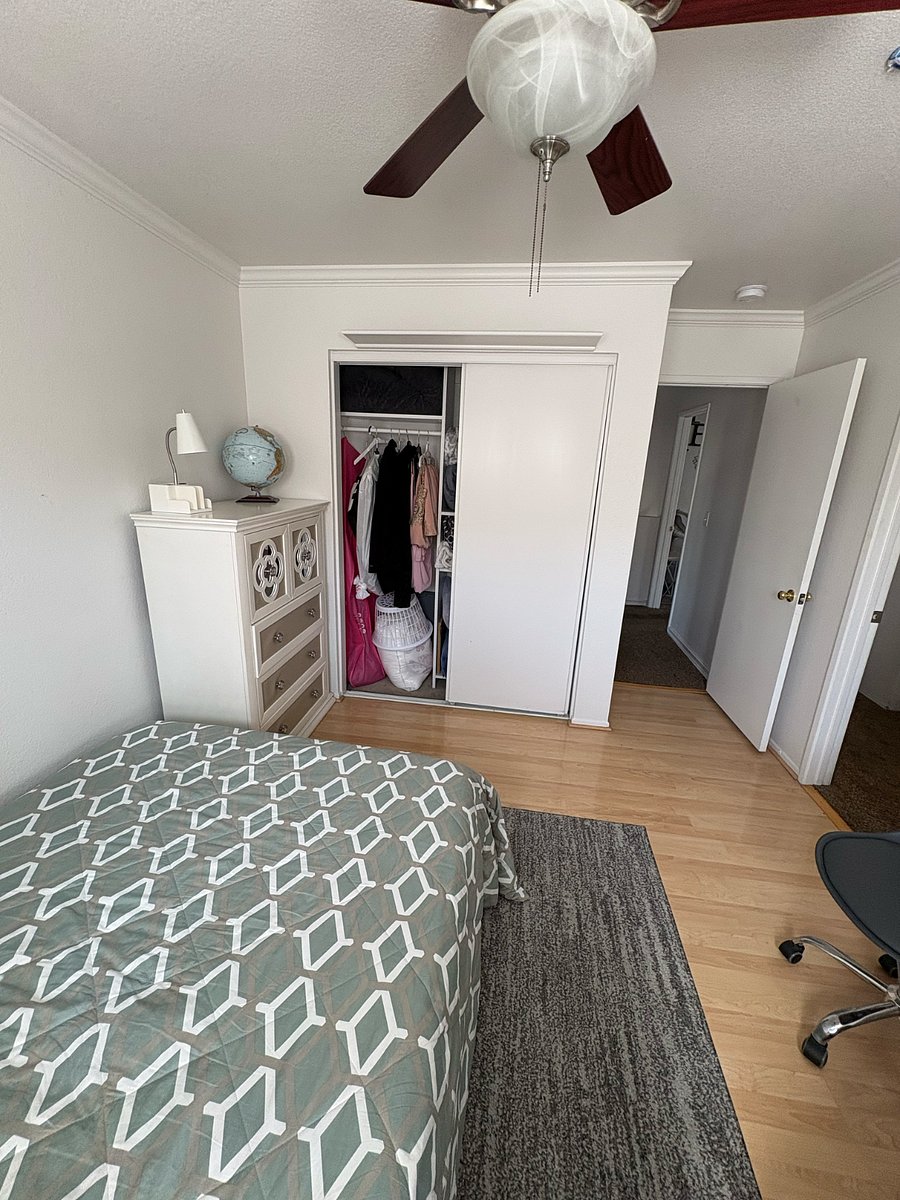 Bedroom with ample closet space