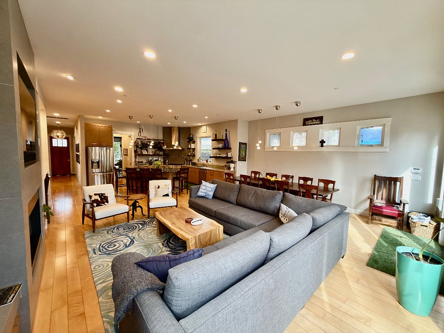 room for a crowd with comfy couches and giant table