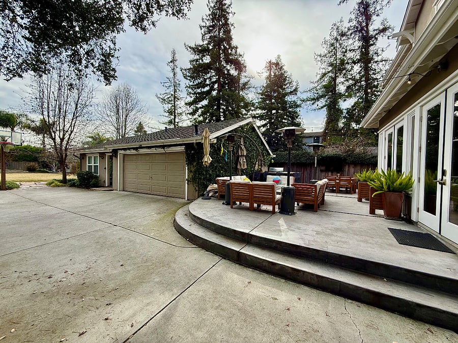 Back patio and detached garage and rec room