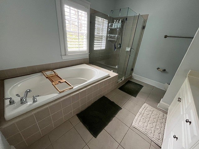 Primary bath with large walk in shower and huge soaking tub