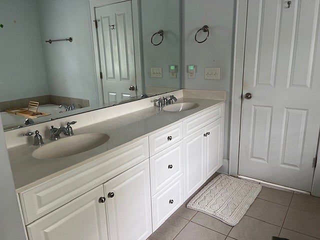 Primary bath features dual sinks and large counterspace