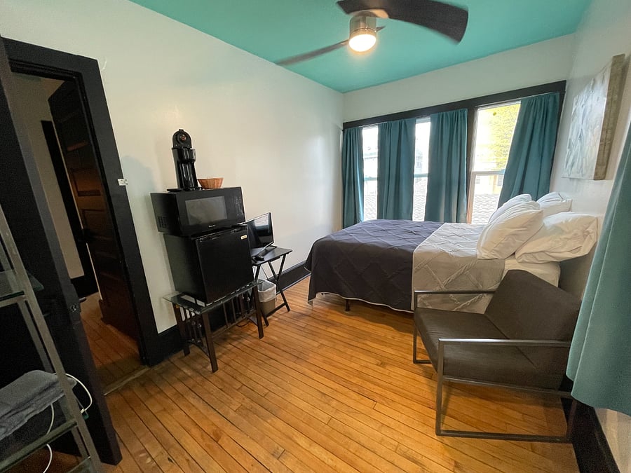 TV, Bedroom 5: Full size bed, microwave, mini-fridge, single-serve coffee maker and attached bathroom