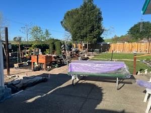 Very large backyard with veggie garden, barbecue grill, picnic table and Adirondack and no backyard neighbors.