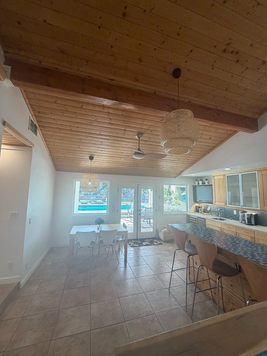 Spacious kitchen with ample seating and a dining tableideal for everyday living and entertaining.