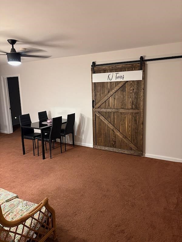 Different angle of kitchen table with 4 chairs