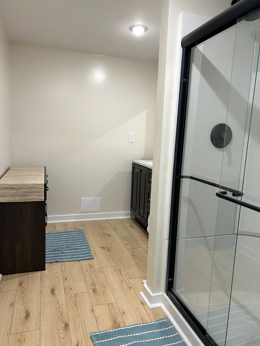 Downstairs bathroom with full shower.