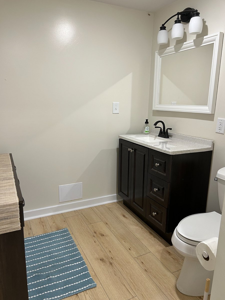Downstairs bathroom with full shower.