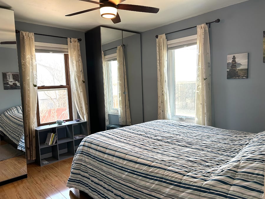 Bedroom 1 "Iceland" with Queen Bed. Storage drawers under the bed and 2 vanity closets with drawers and 2 hanging racks each.
