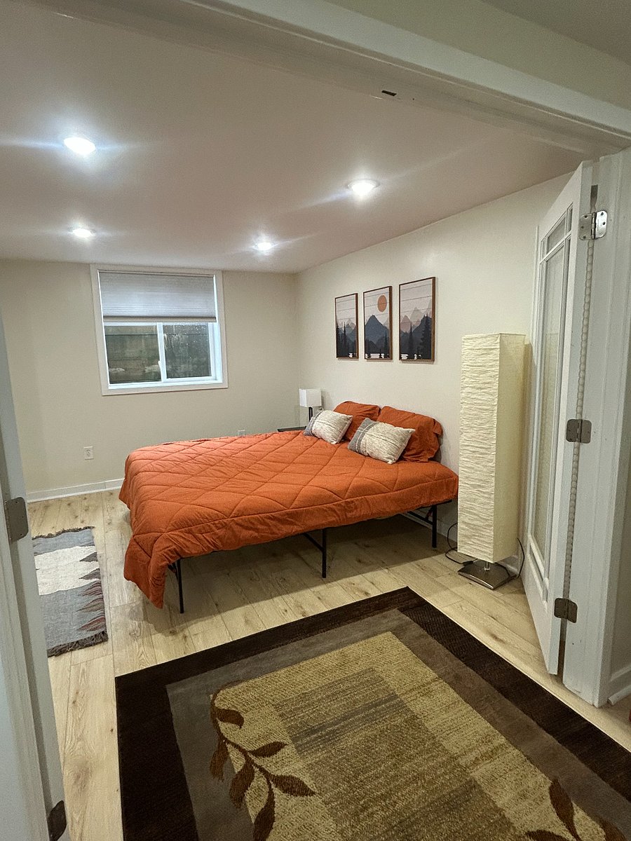 Downstairs "Mountain" room with options of 2 twin beds or 1 large king with 2 inch bonus topper for added comfort
