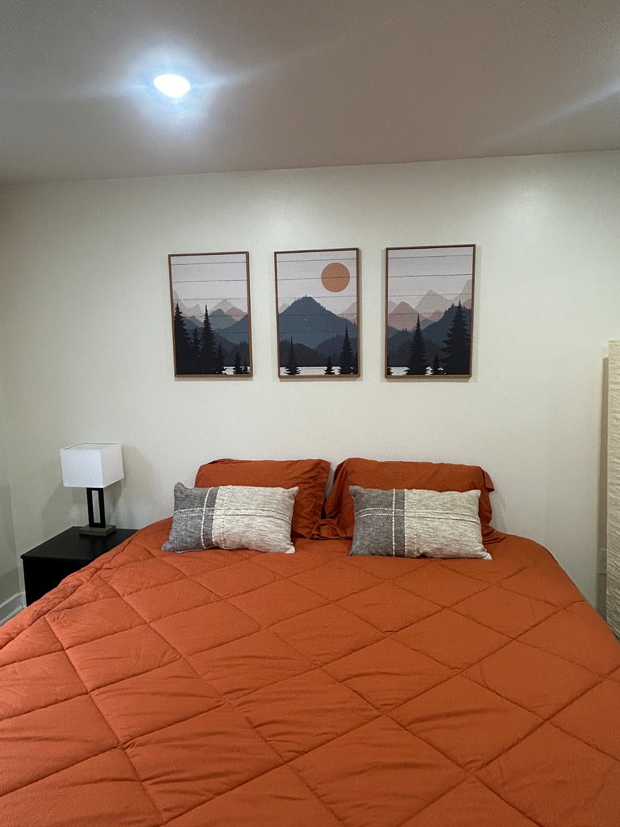 Downstairs "Mountain" room with options of 2 twin beds or 1 large king with 2 inch bonus topper for added comfort