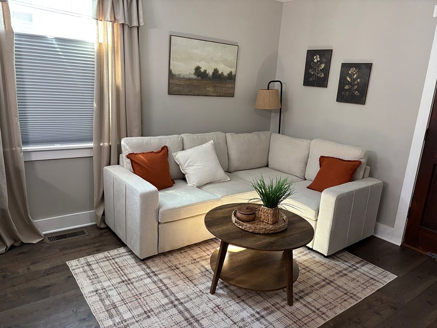 Sectional sofa; long based has a pull out section making an additional queen-sized sleeping area or comfortable lounging area.