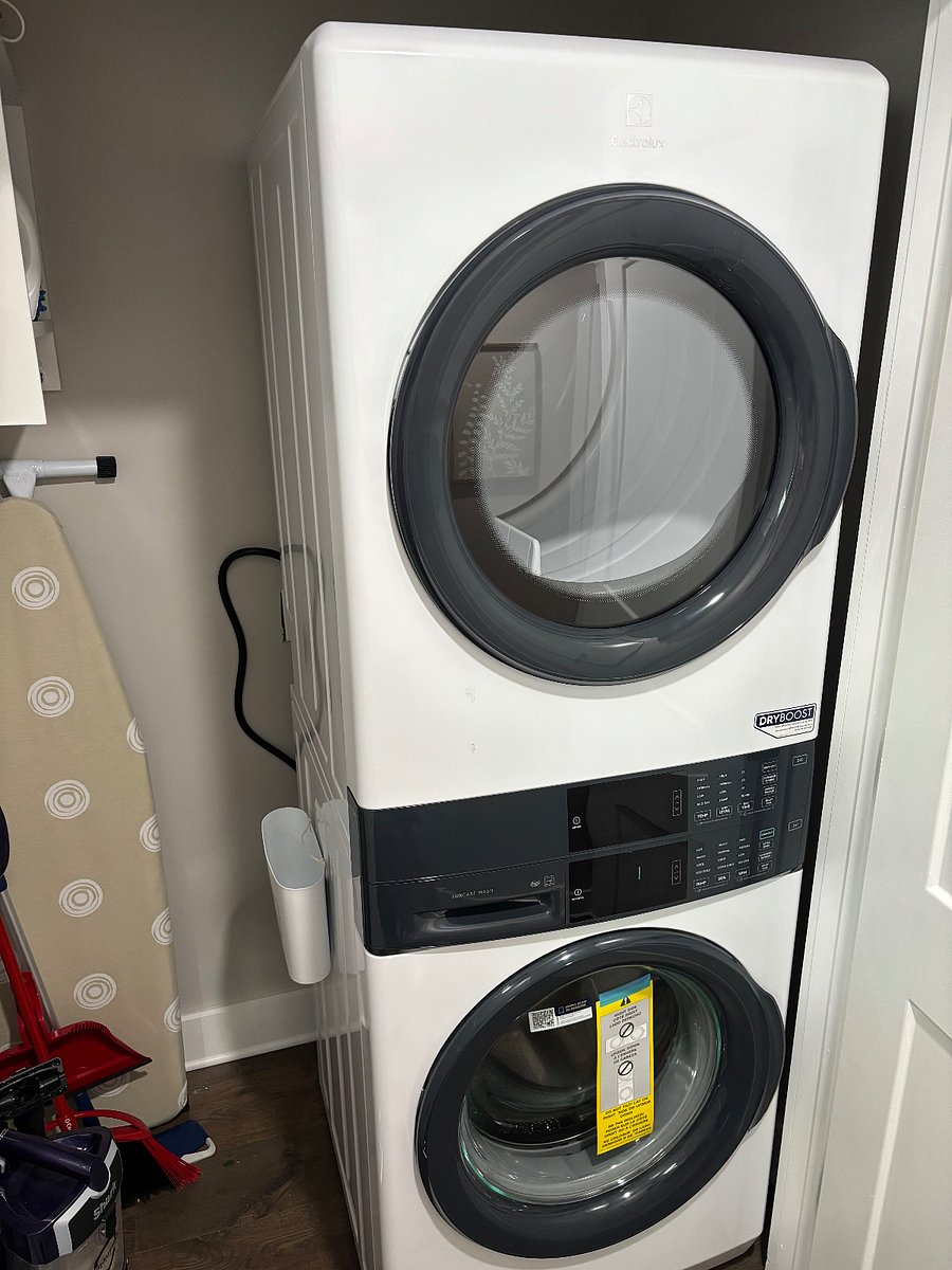 Elextrolux Laundry Center with controls in the middle for easy reach.