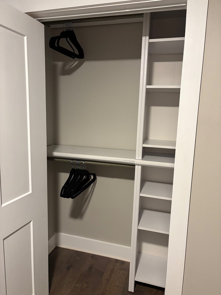 Custom closet with multiple shelves.