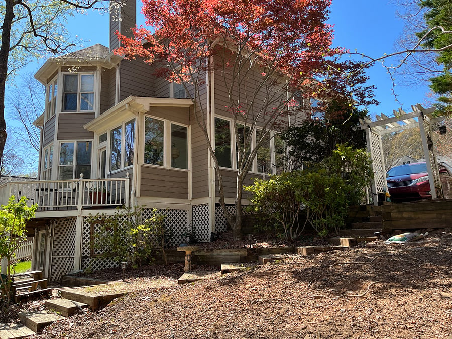 Outside - Pathway to basement apartment. Through arbor, down steps, under deck to entrance door. All well lit with remote lighting.