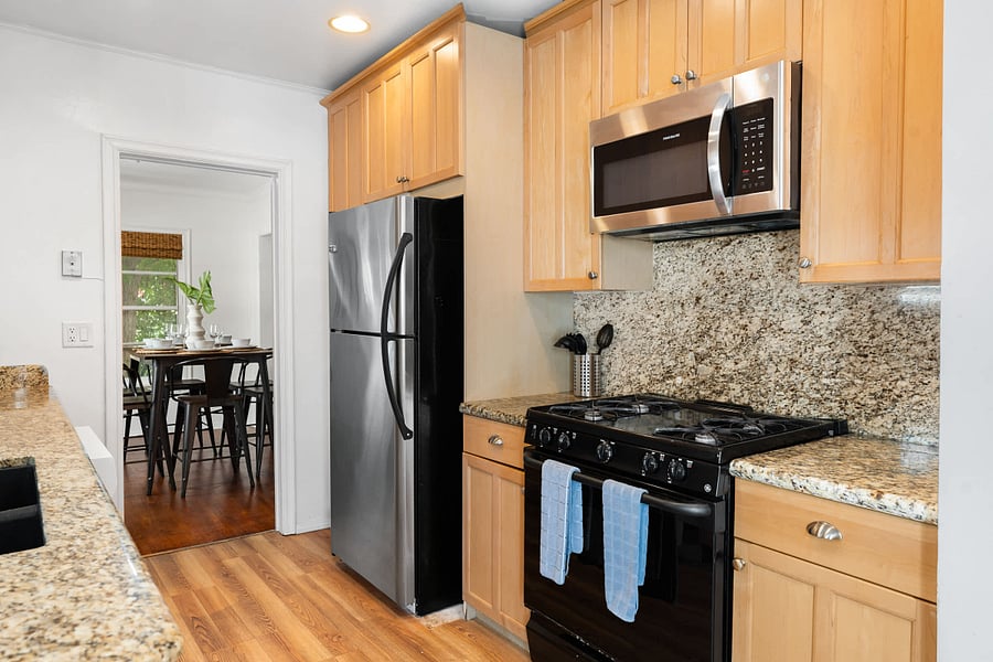Step into this bright kitchen and start creating your favorite meals with ease.