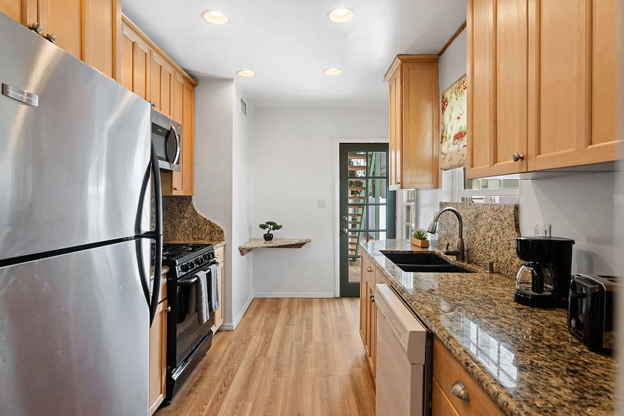 Step into this bright kitchen and start creating your favorite meals with ease.