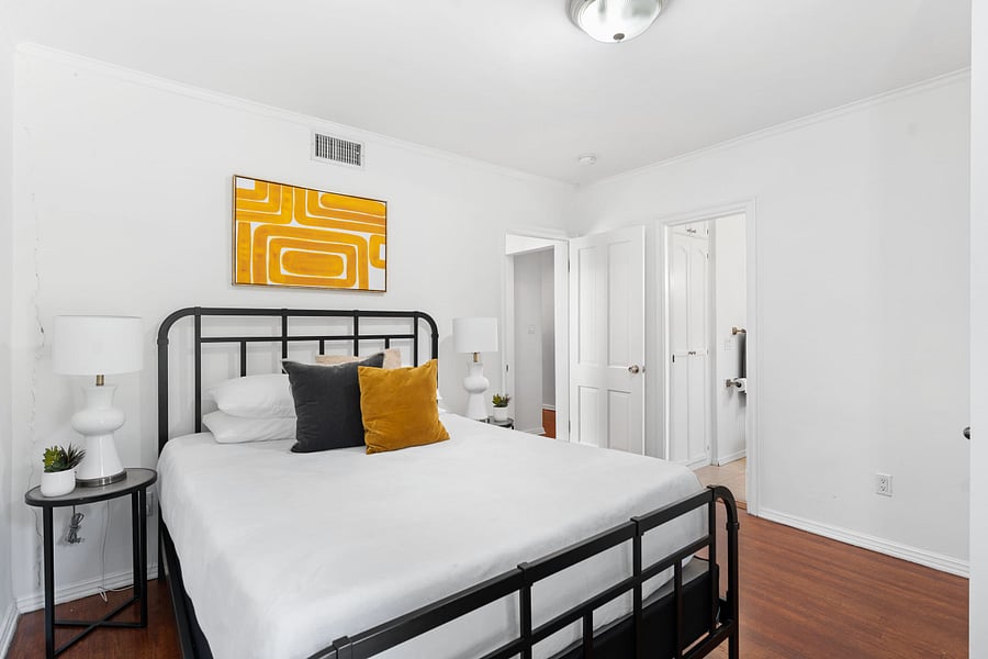 Settle in, recharge, and embrace calm in this well-designed bedroom.