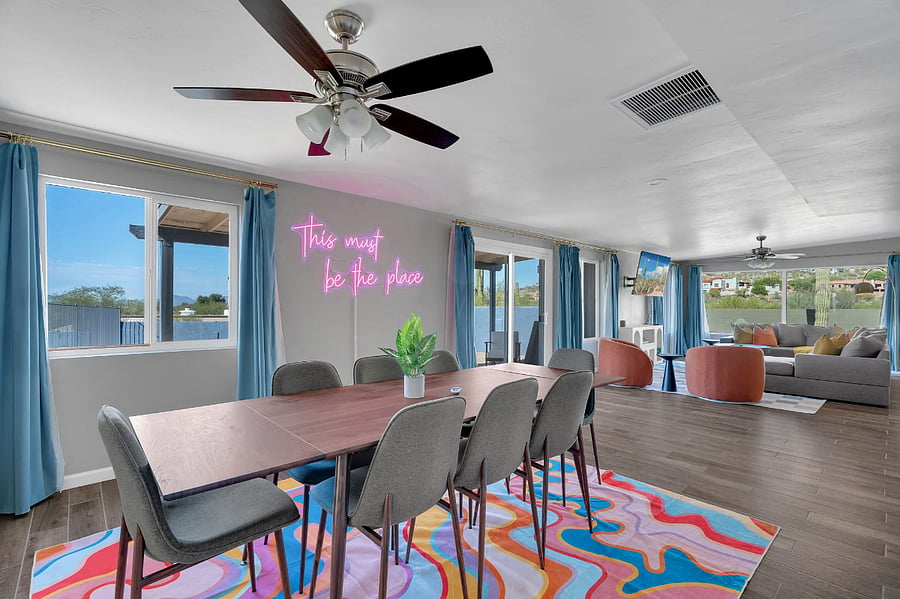 Unwind in a bright, modern living room with a plush sofa, smart TV, and stylish dcor. Natural light fills the space, creating a warm, relaxing atmosphereperfect for movie nights or quiet evenings in.