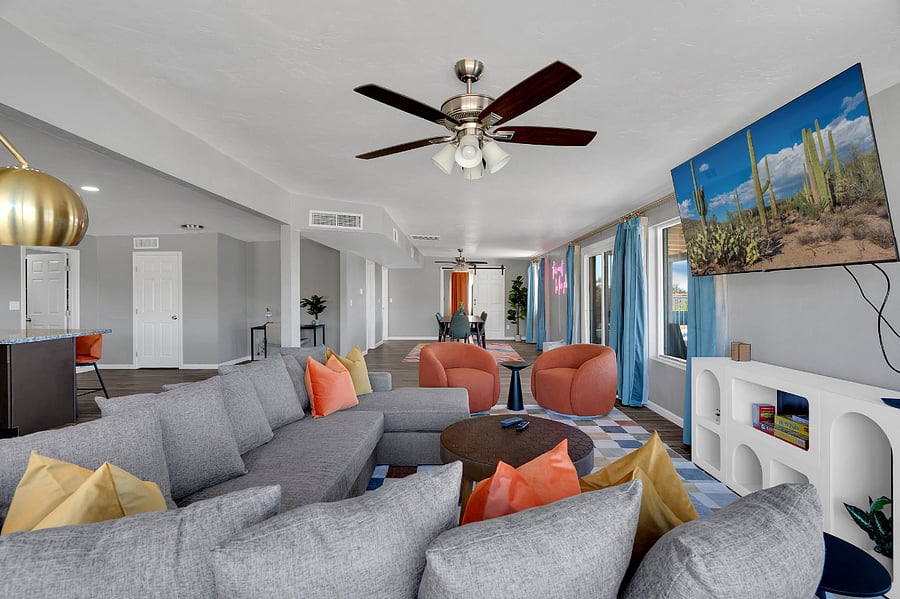 Enjoy the comfort of a chic living room with modern furnishings, a flat-screen TV, and plenty of natural light. Whether youre lounging with a book or catching a movie, this space invites you to unwind.