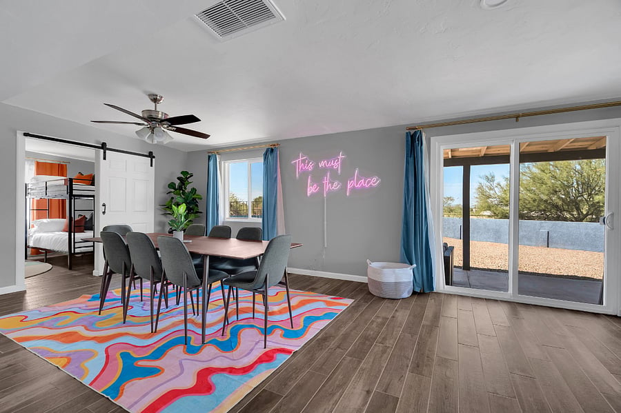 Share meals in a rustic-inspired dining space featuring natural textures, wooden accents, and a welcoming atmosphereideal for enjoying local flavors or a homemade breakfast.