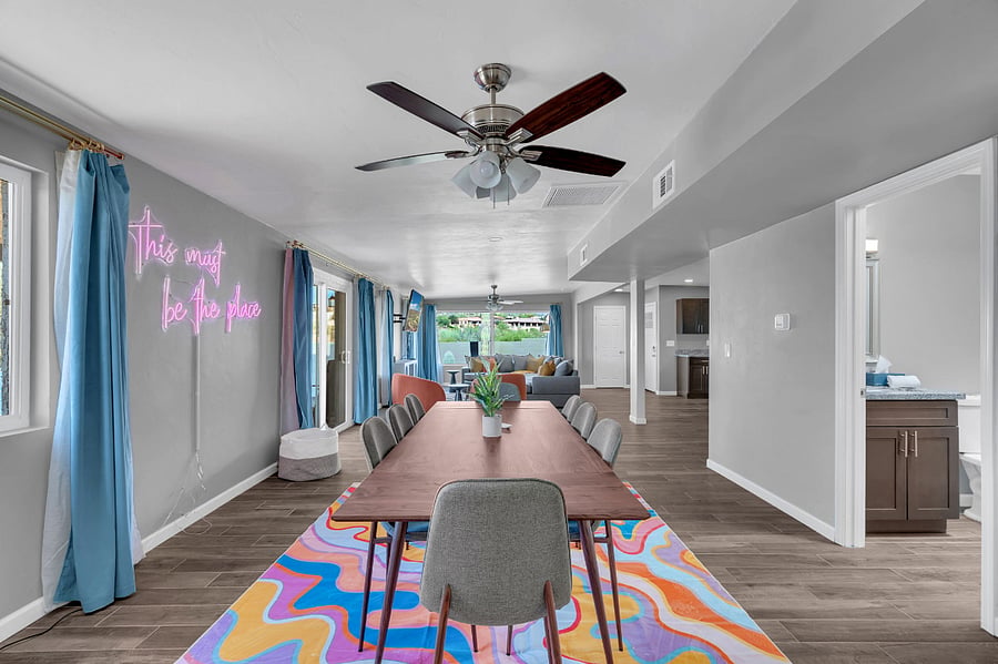 Gather the whole group at this spacious dining table, perfect for family dinners or game nights. The open design and comfortable seating make every meal a shared experience.
