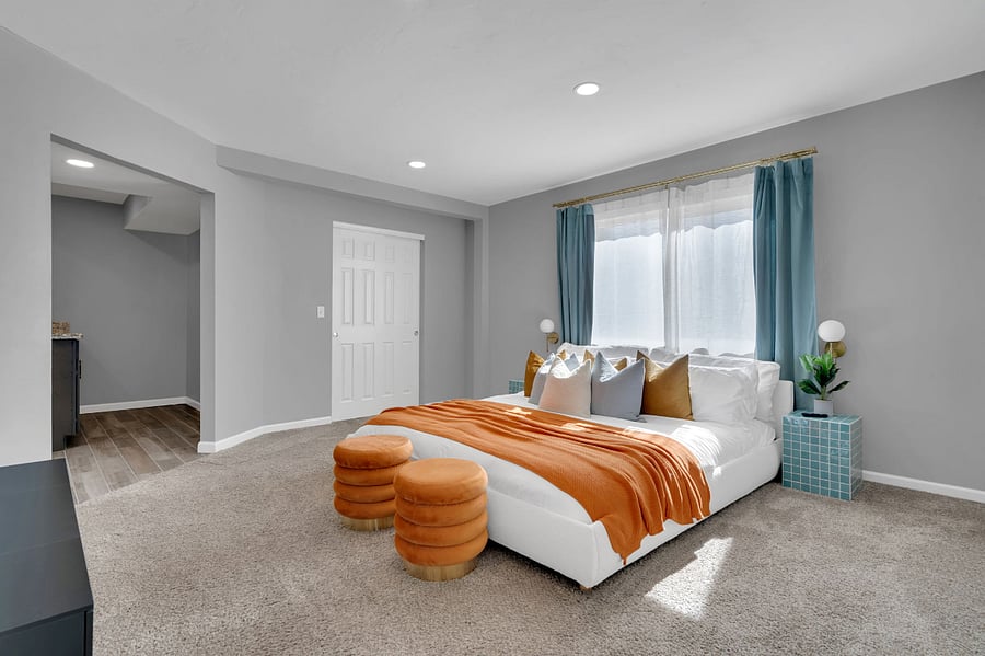 Relax in this serene bedroom featuring a comfy queen bed, smart TV, and calming dcor. Ideal for couples or two guests, it offers a quiet retreat for restful nights and cozy mornings.