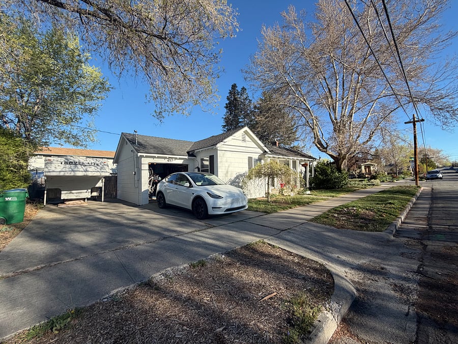 Ample offstreet parking and EV charging capability via garage. Garage storage. Lots of available street parking on quiet street and corner lot