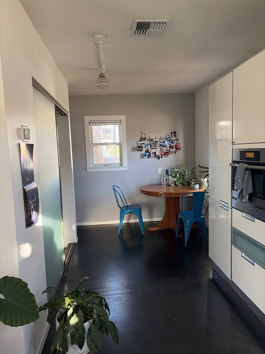 Dining space, microwave/oven, fridge/freezer, washer/dryer/utility closet