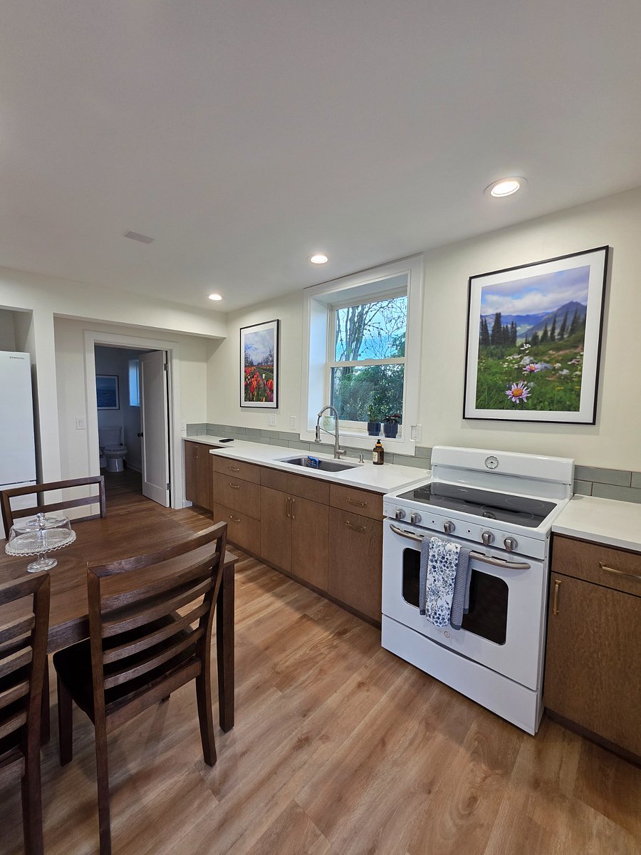 Kitchen has all essentials including cookware, spices, blender, toaster, microwave, kettle.
