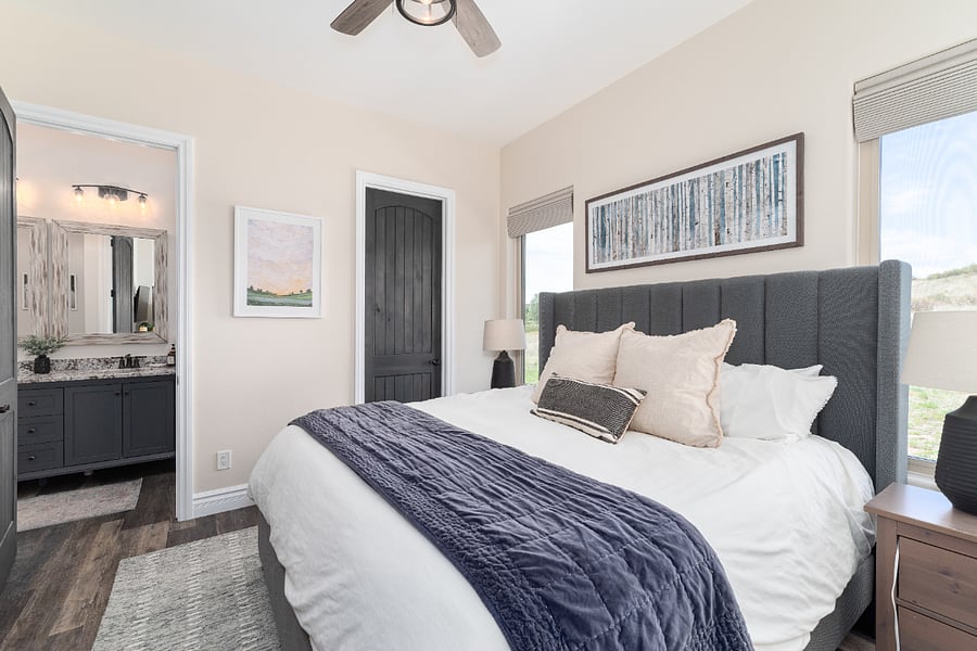 There is an attached bathroom and walk in closet in the primary bedroom. 