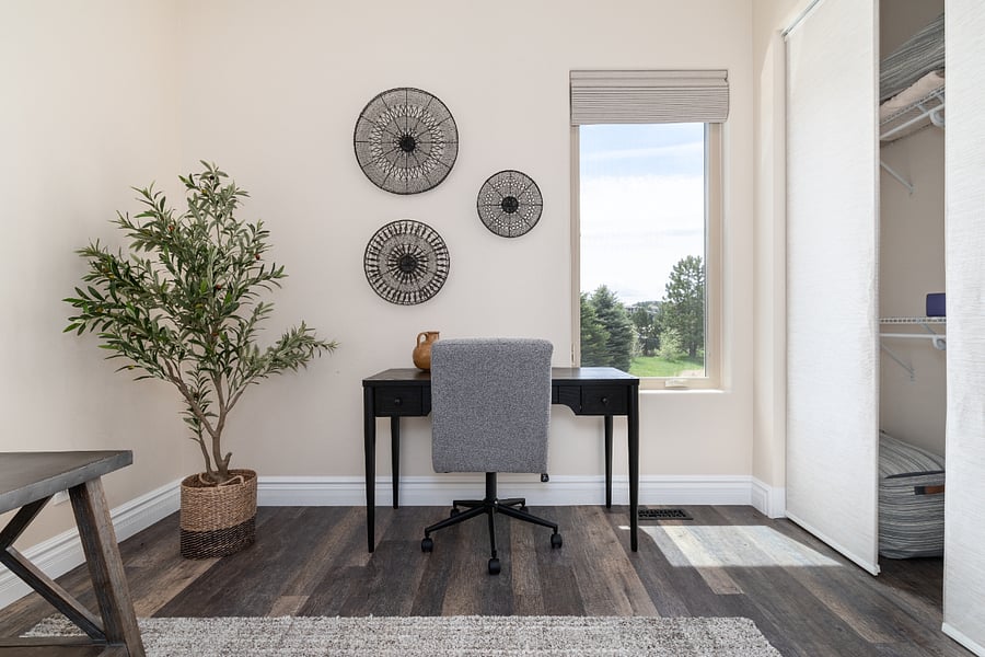 Office space with lots of natural lights, the Hunter Doublas shades are blackout and automated with a remote control. 