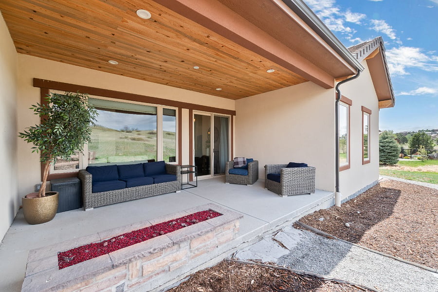 Private patio with a fireplace. The patio looks out onto the golf course so you have privacy. 
