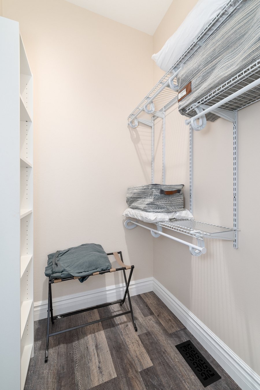 Walk-in closet in the primary bedroom. 