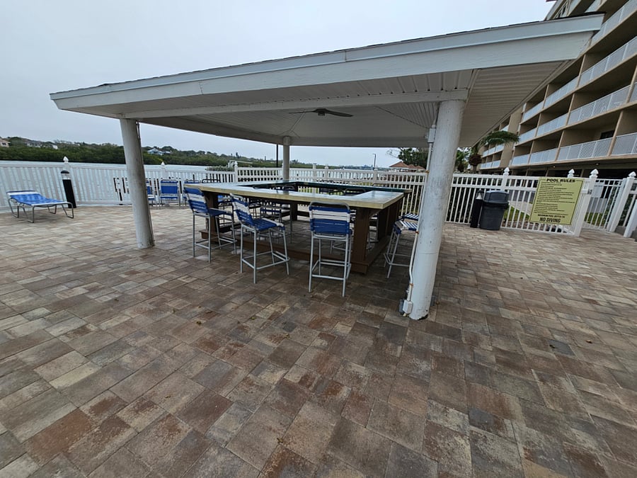 The pool area features a Lanai and 2 gas grills for guest use.