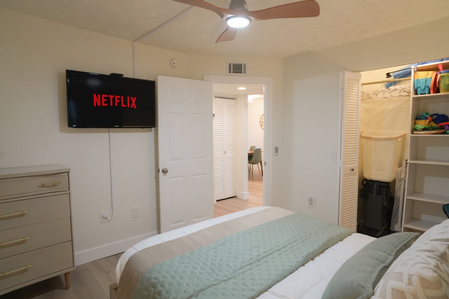 Guest Bedroom features a Queen Bed and a Twin Trundle, TV w/ streaming, closet and dresser.