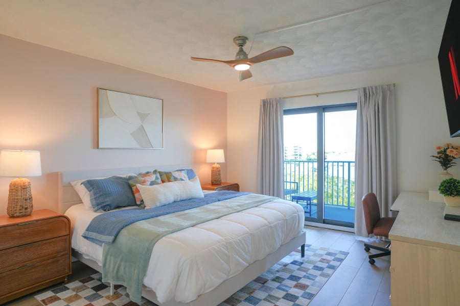 Primary Bedroom features a King Bed and a pullout twin cot, a 55" Smart TV and a wall-in closet
