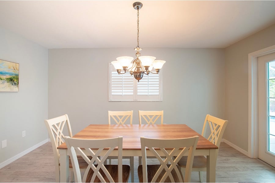 Dining room with pool area to the right