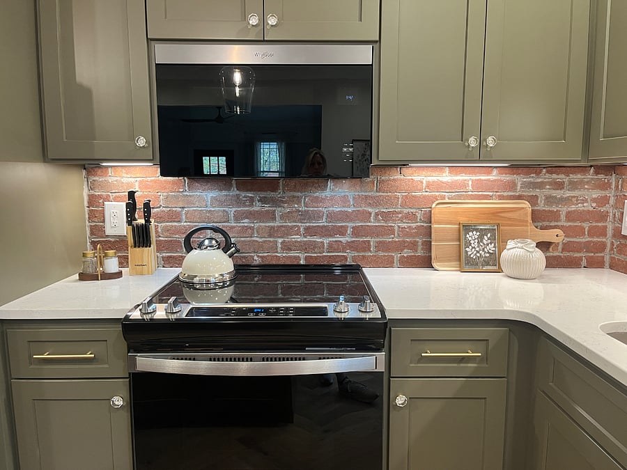 Kitchen with all new appliances, pots, pans, and dishes.