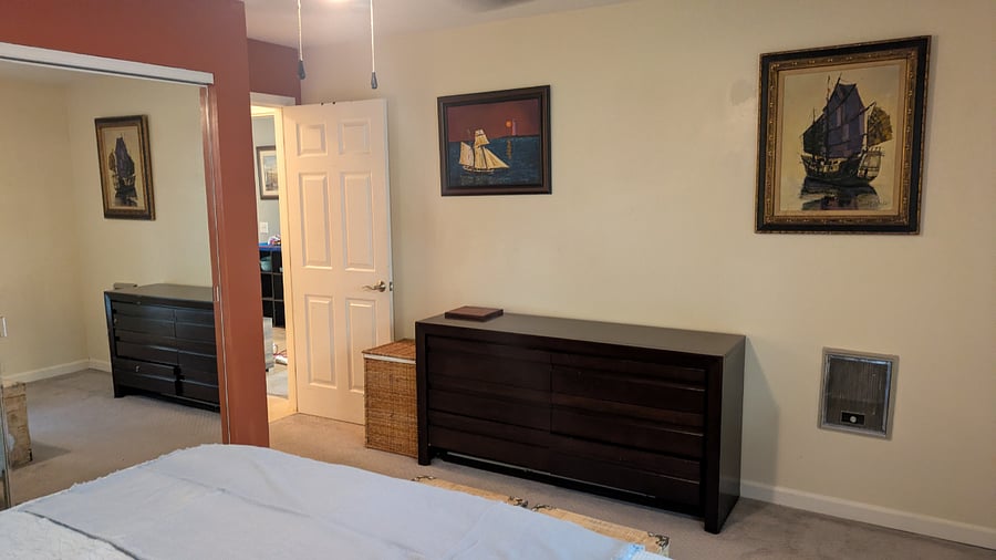 Bedroom facing towards the door