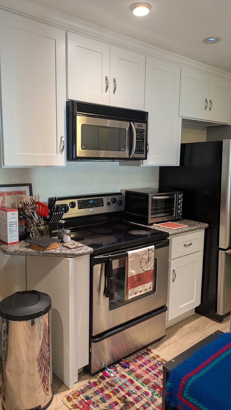 Kitchen facing the stove/microwave
