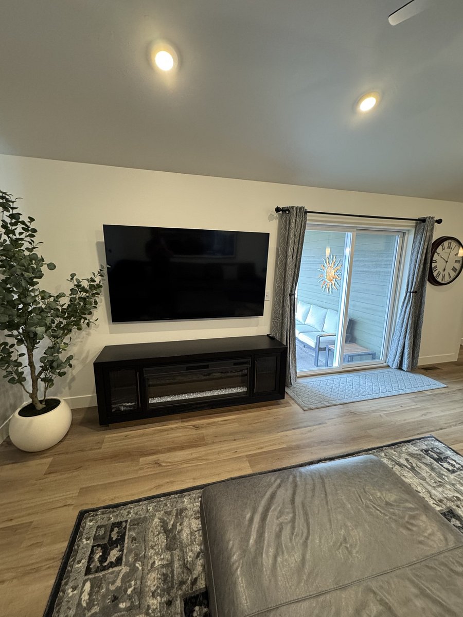 Main living area with 75" TV