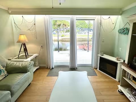 view on canal from open plan living/dining room