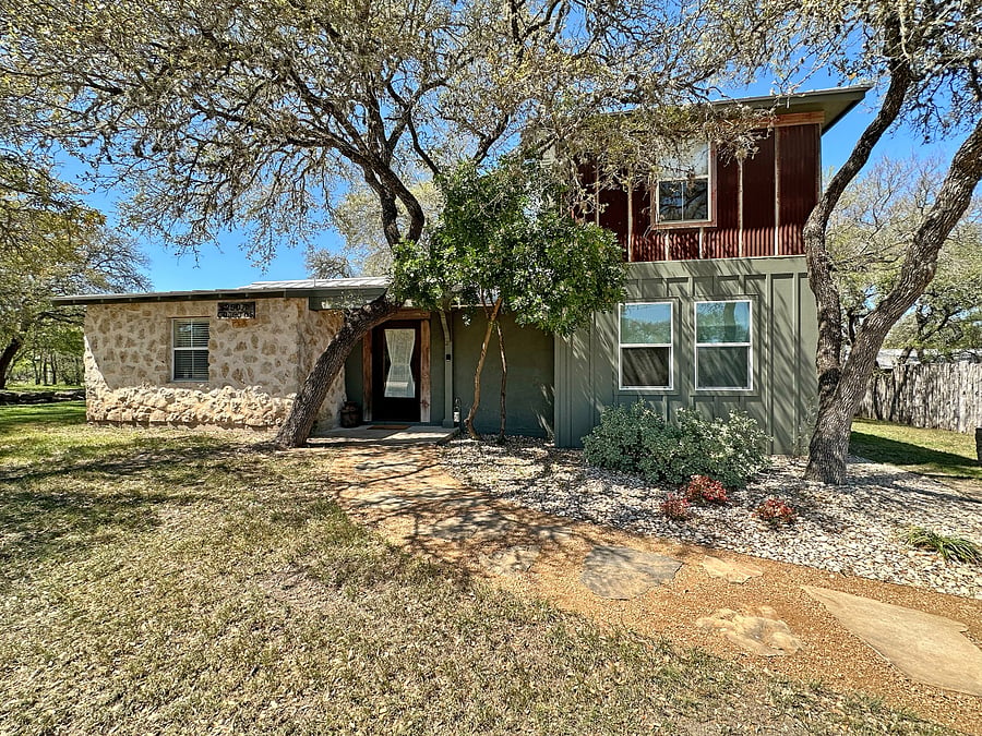 The front of the house is built with a variety of materials, making it a one-of-a-kind home. The mix of new and vintage materials is a nod to its history.