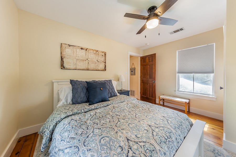 Second bedroom, with queen bed, on the second floor overlooking backyard, an abundance of natural light and black-out blinds.