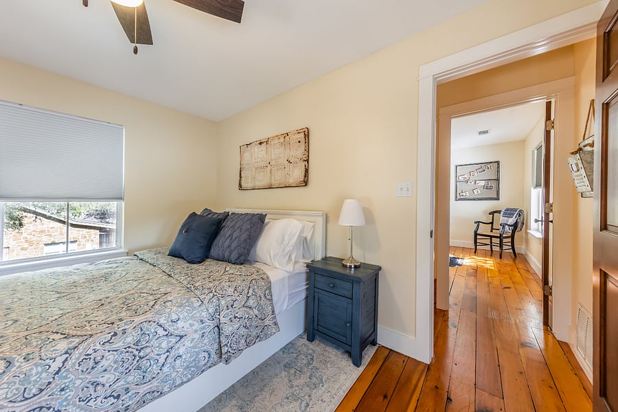 Second and third bedrooms share the second floor with staircase between them.