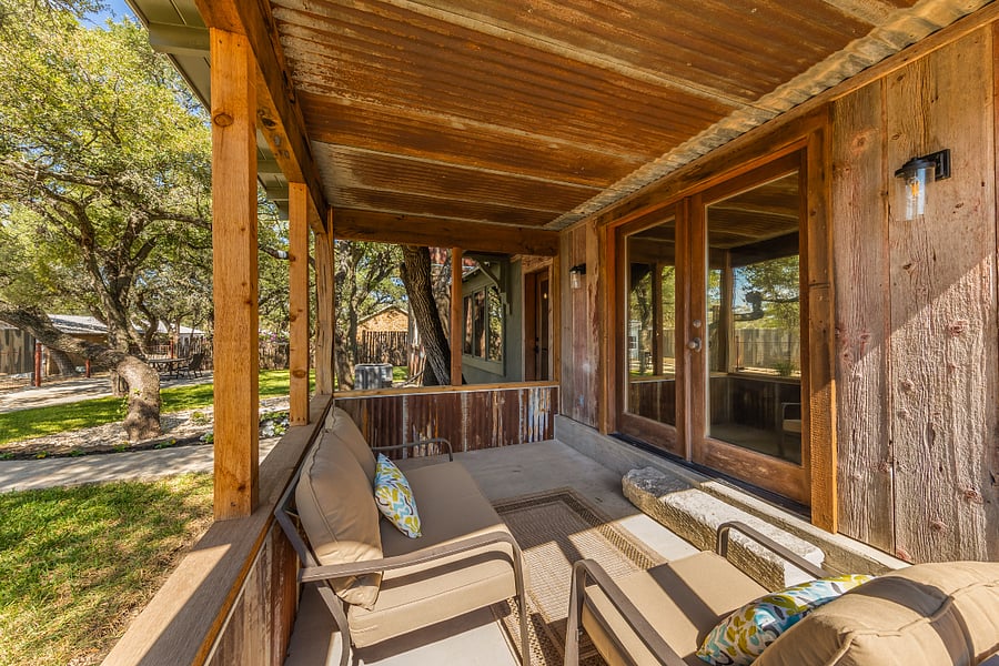 Patio with seating off the primary suite.