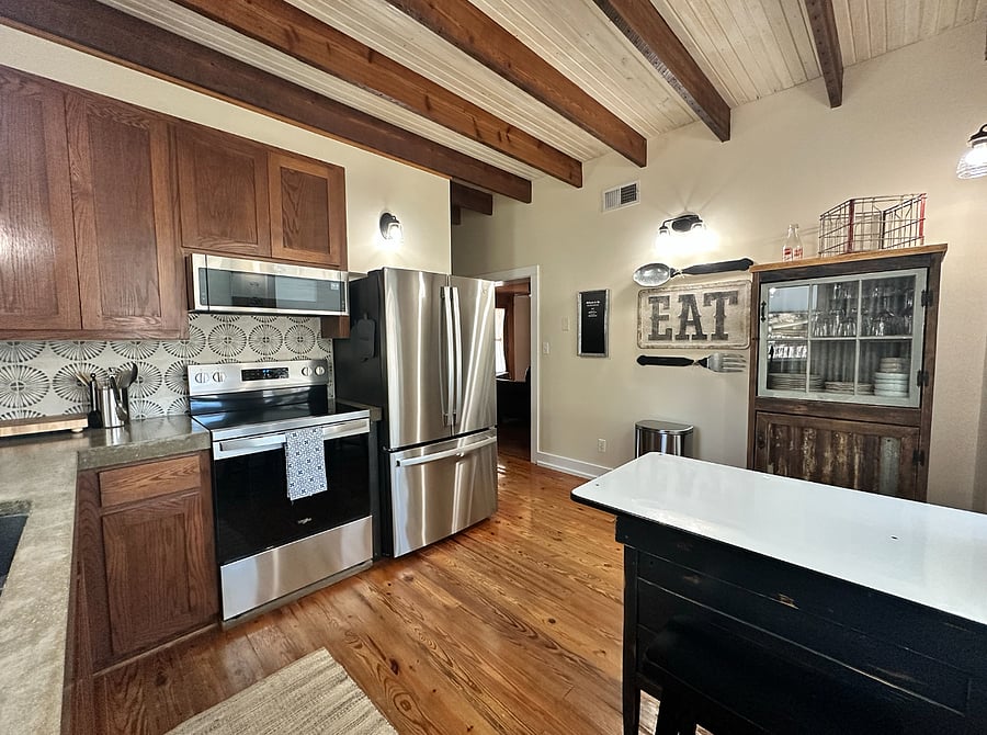 Newly renovated kitchen, with all new appliances. Concrete counters and fully equipped for your cooking needs.