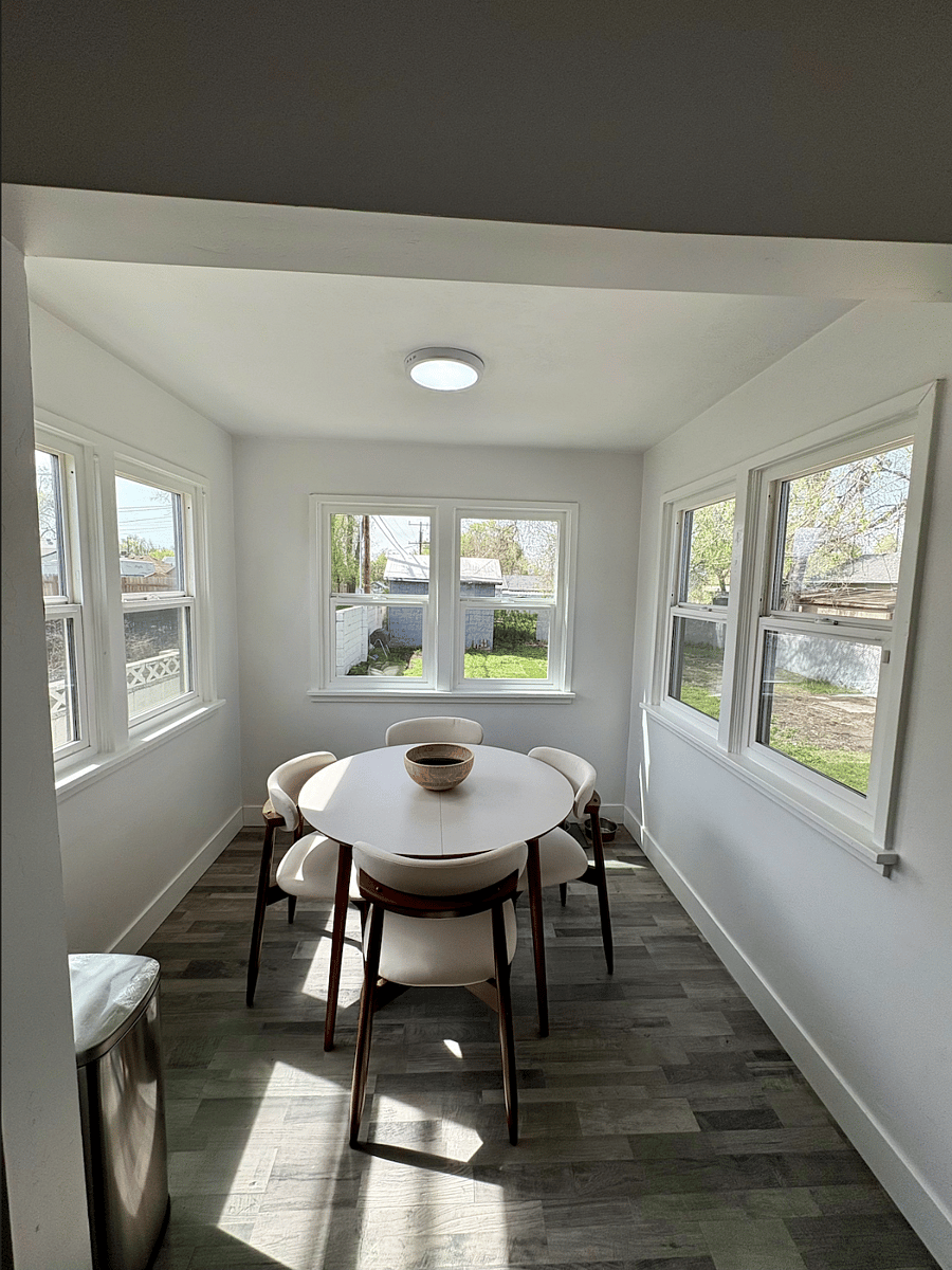 Shared dining room with view of backyard.